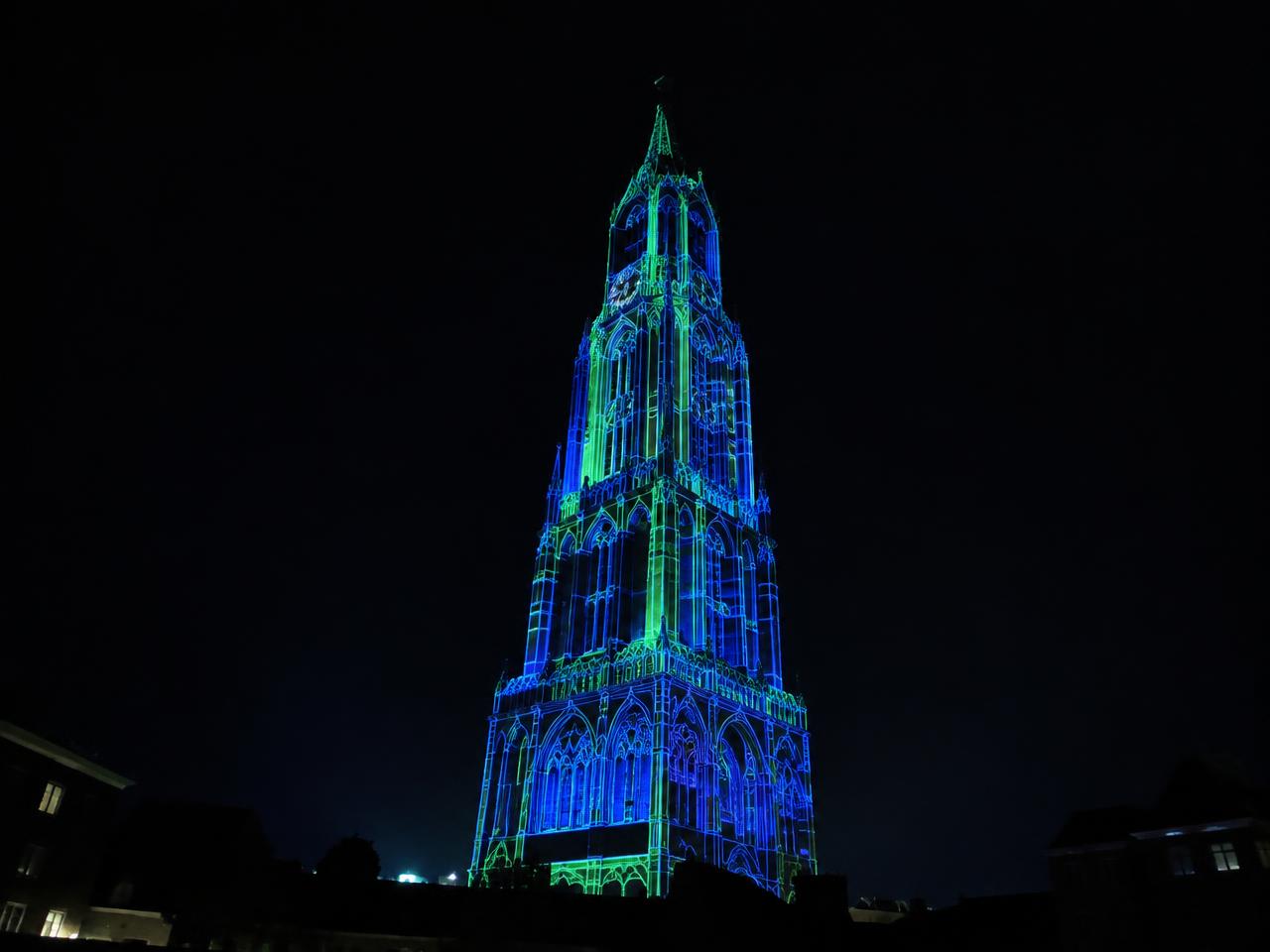 Laser mapping on a tower at night